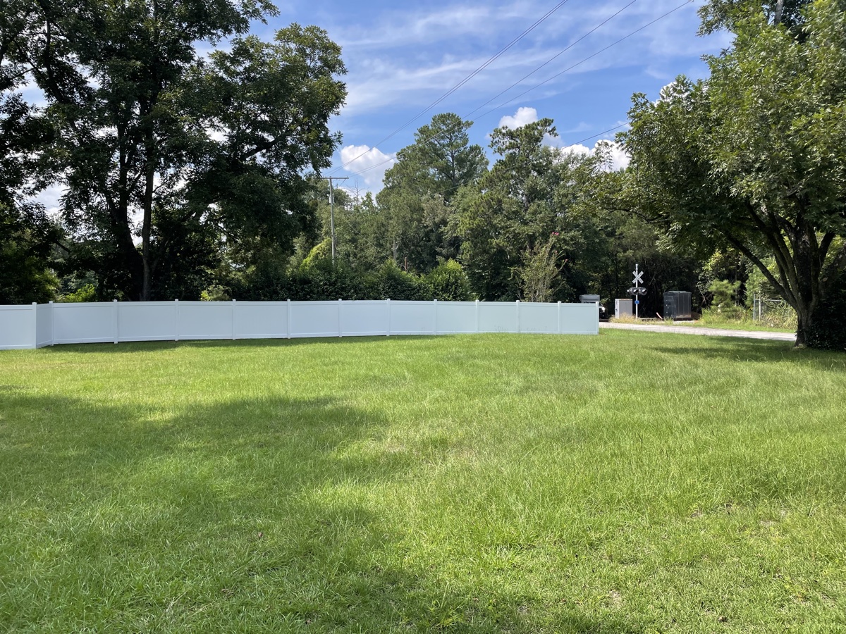 Vinyl fence installation Columbia SC — day 4, nearly fully enclosed